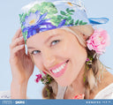 A woman wearing FarmHouse Fresh Smurf Fruits & Wonders Silky Scarf on her head. All profits help rescue animals.