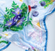 A close-up of FarmHouse Fresh Smurf Fruits & Wonders Silky Scarf. All profits help rescue animals.
