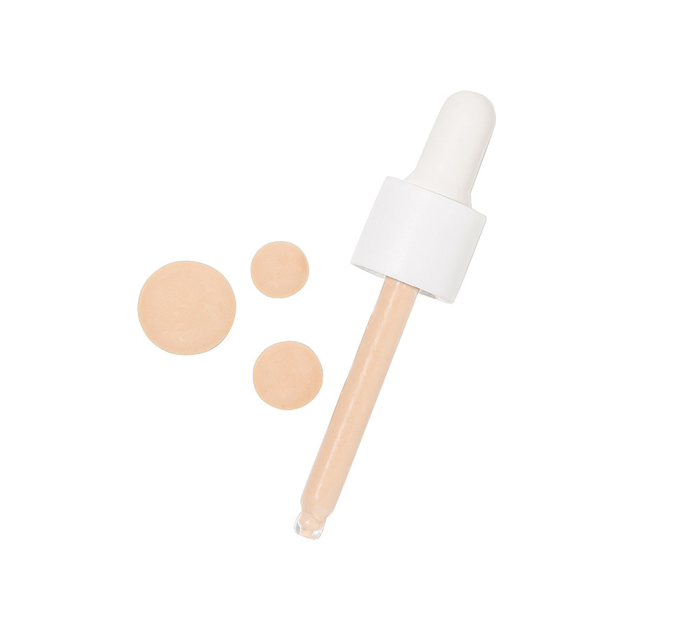 Tint-sational Serum dropper with fair to light serum drops