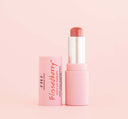 A tube of FarmHouse Fresh Blissedberry Juicy Lip Therapy that hydrates dry lips with a hint of color.