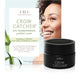 A jar of Crow Catcher Eye Transforming Serum by FarmHouse Fresh with a box next to it, made to diminish fine lines and wrinkles in the eye area.
