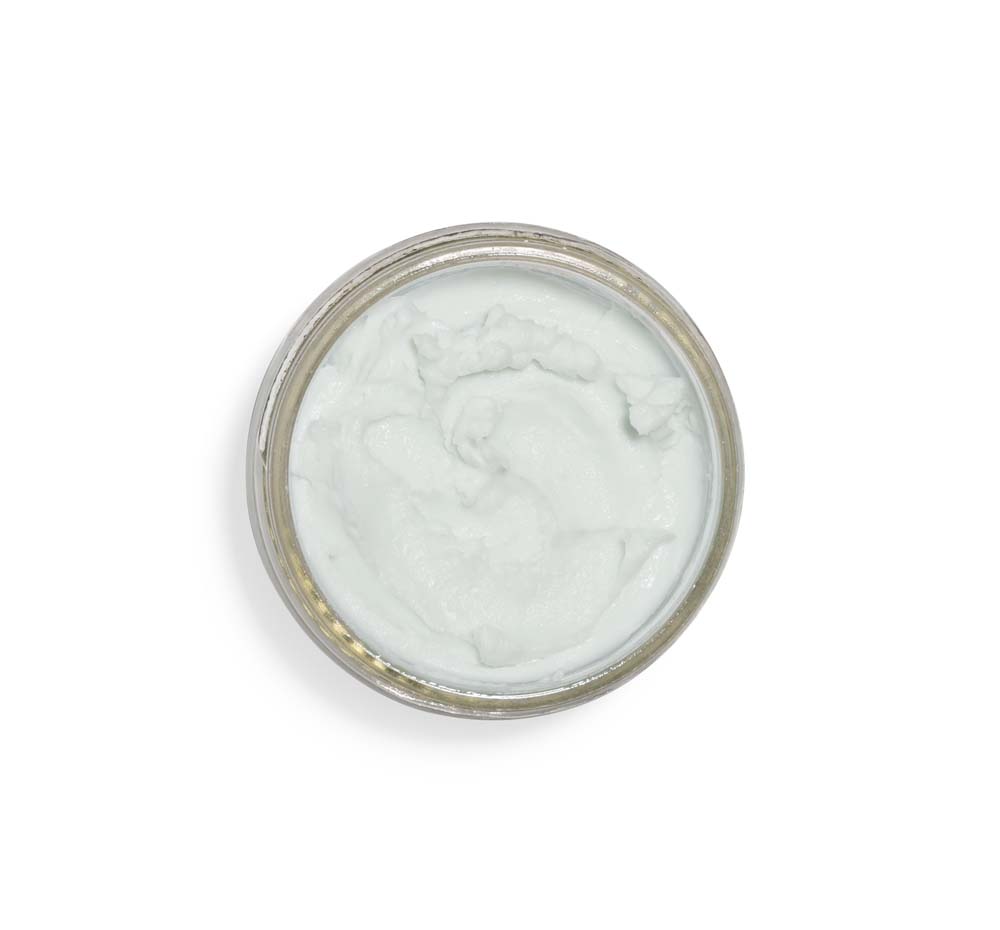 Top view of an opened jar of FarmHouse Fresh Enrich Mint Foot Rescue Mask that hydrates and nourishes dry cracked heels.