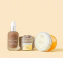 Papaya Glow Head To Toe Bundle by FarmHouse Fresh For Dull & Dehydrated Skin Types on a yellow background.