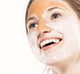A woman with Splendid Dirt Nutrient Pumpkin Mud Mask on her face’s T-zone to pull excess oils and clean pores.