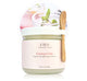 A jar of Farmhouse Fresh Rasmopolitan body scrub that exfoliates and that brings softness to skin.