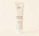 A tube of lightweight Sweet Cream Milk Lotion by FarmHouse Fresh with a long-lasting scent of sugar and cream.