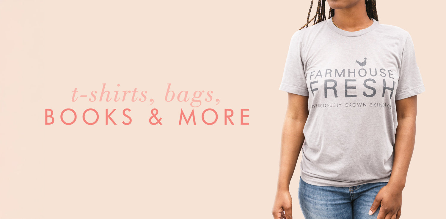 A woman wearing a t - shirt that says farmhouse fresh.
