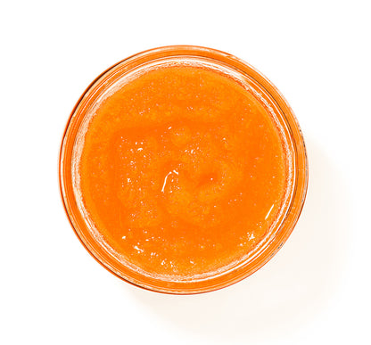 FHF Blood Orange Glowrita body polish top view of the open jar, showing rich orange color of the body polish
