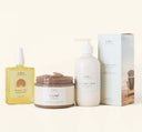 Bundle Bronzed Babe Body Set by FarmHouse Fresh that includes a body scrub, body lotion and a self-tanner.