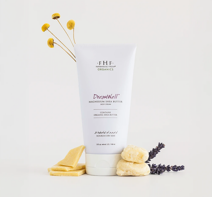 DreamWell™ Magnesium Organic Shea Butter Body Cream tube with natural ingredients like lavender, organic shea and cocoa butters.