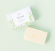 A bar of FarmHouse Fresh Fluffy Bunny Shea Butter Soap next to a box. Made with all-natural ingredients suitable even for people with sensitive skin.