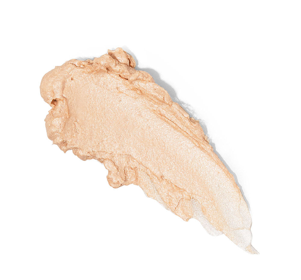 A swatch of FarmHouse Fresh Golden Moon Dip face Mousse with Retinol and Wrinkle-Targeting Peptides that delivers softness, illumination, firmness to skin.