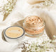 A jar of FarmHouse Fresh Golden Moon Dip Face Mousse with Retinol and Wrinkle-Targeting Peptides that instantly brings a pretty, natural golden glow to complexion.