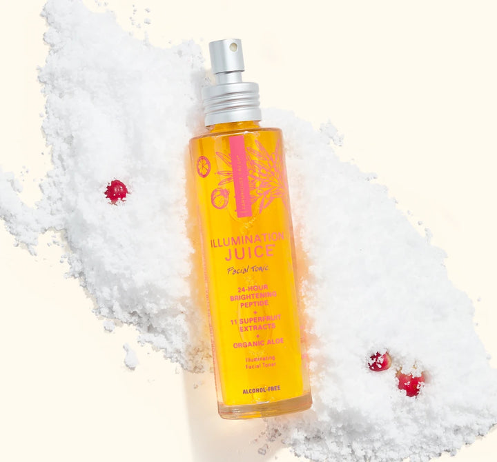 FarmHouse Fresh Illumination Juice Facial Tonic brightening toner styled with festive holiday greenery and red berries