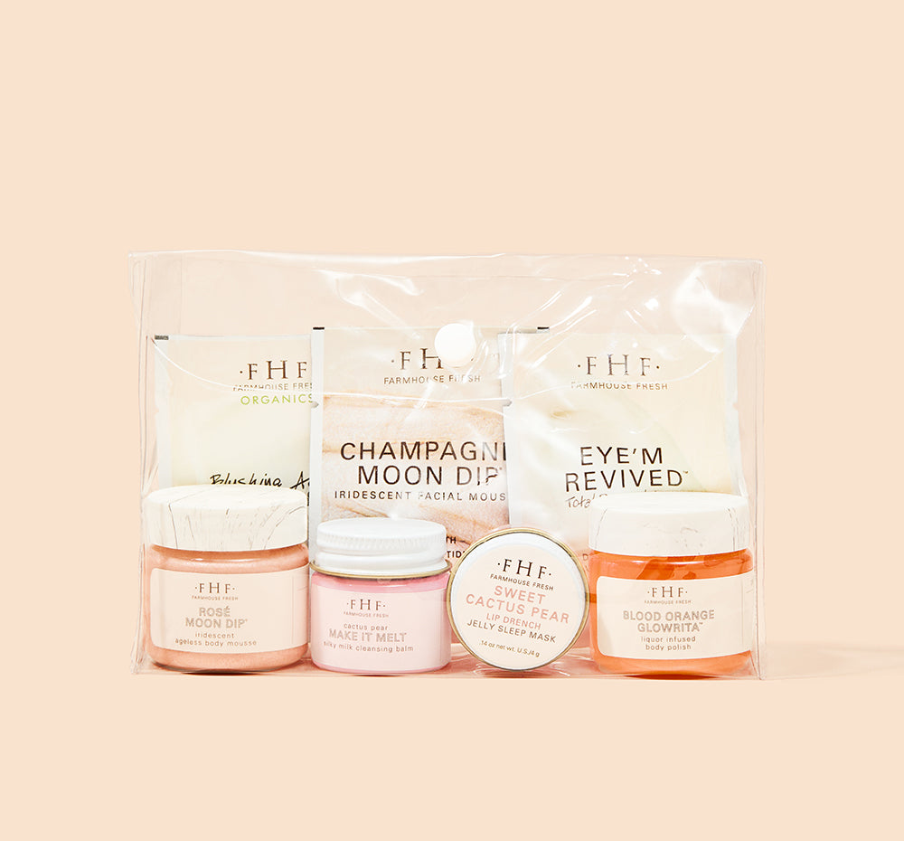 Jet Set Glow 7-piece sample kit designed to smooth, brighten, and illuminate your skin in a clear vinyl snap bag.