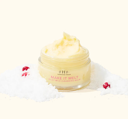 FarmHouse Fresh Make It Melt Silky Milk Cleansing Balm styled with festive holiday greenery and red berries