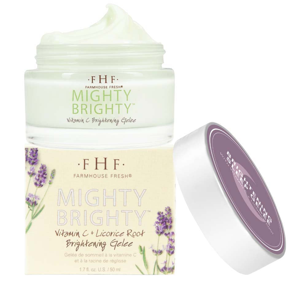 A jar and a box of FarmHouse Fresh Mighty Brighty Vitamin C Brightening face moisturizer made with natural botanical ingredients.