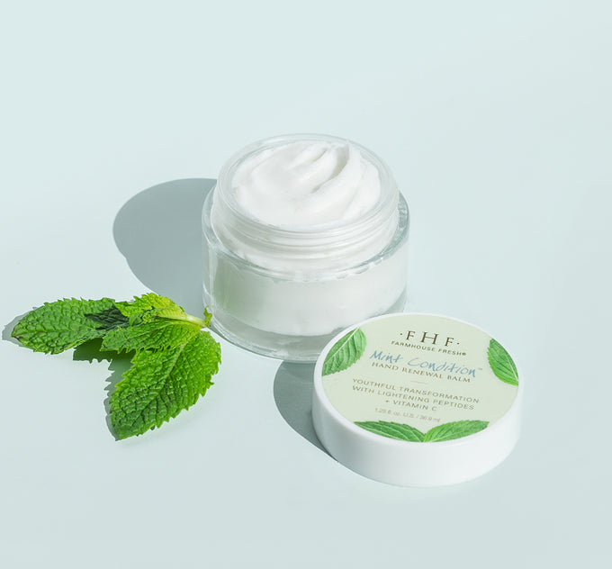 Mint Condition Hand Renewal Balm on a green background