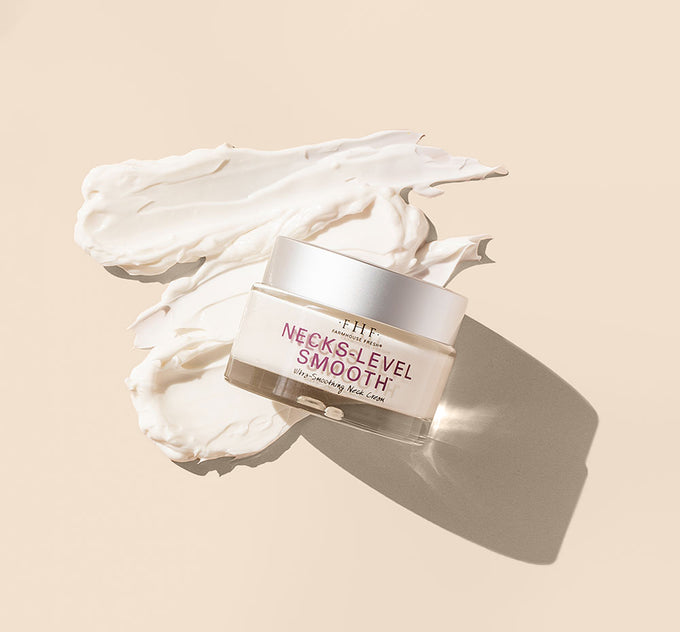 A jar of FarmHouse Fresh Necks-Level Smooth Ultra-Smoothing Triple Effect Neck Cream that targets fine lines and wrinkles.