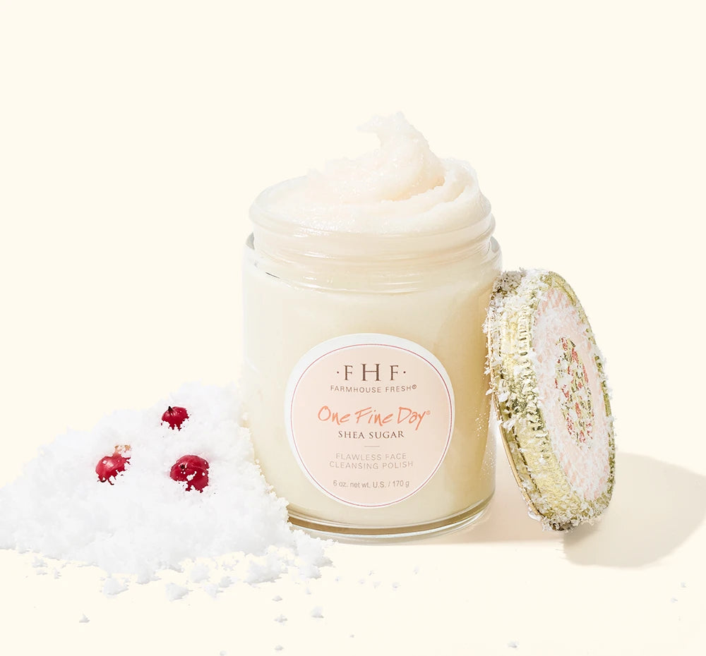 FarmHouse Fresh One Fine Day Shea Sugar Face Polish styled with festive holiday greenery and red berries