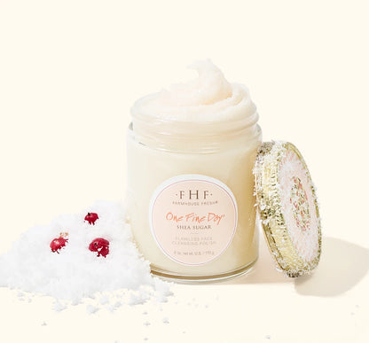 FarmHouse Fresh One Fine Day Shea Sugar Face Polish styled with festive holiday greenery and red berries