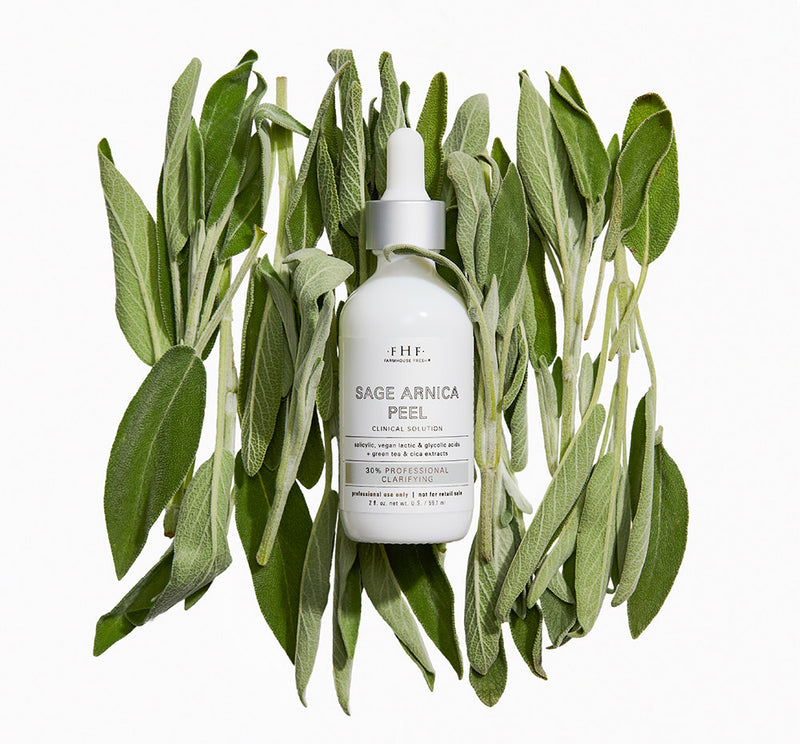 FHF Sage Arnica Peel bottle surrounded by sage leaves on a white background