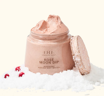 FarmHouse Fresh Rose Moon Dip Ageless Facial Sleep Mousse styled with festive holiday greenery and red berries