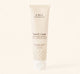 A tube of lightweight Sweet Cream Milk Lotion by FarmHouse Fresh with a long-lasting scent of sugar and cream.