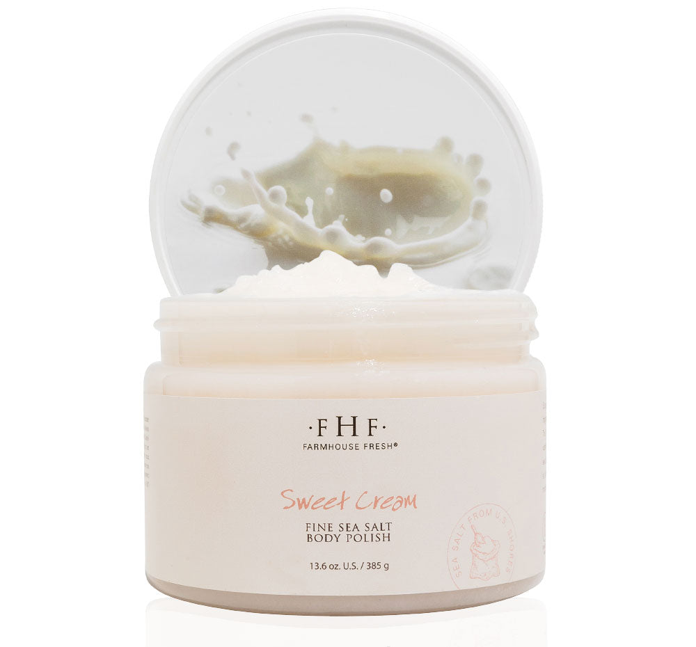 A jar of FarmHouse Fresh Sweet Cream nourishing body scrub with a warm, buttery sweet cream scent.