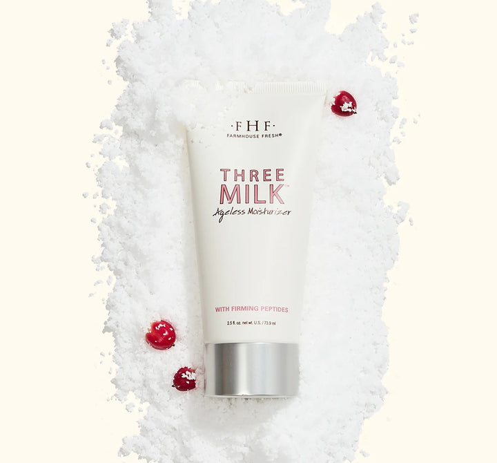 FarmHouse Fresh Three Milk Ageless Sleep Balm nourishing facial moisturizer styled with festive holiday greenery and red berries