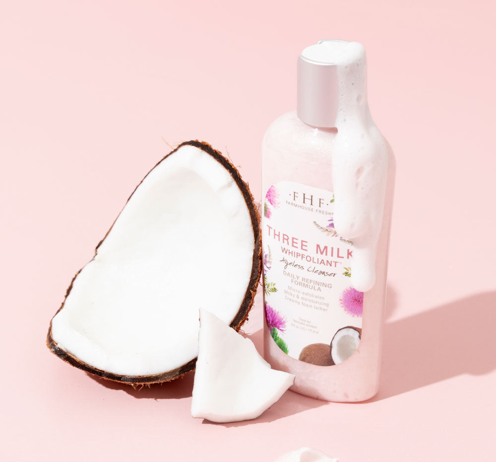 A bottle of FarmHouse Fresh Three Milk Whipfoliant for gentle coconut cleansing