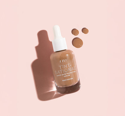 Tint-sational™ Sheer Skin-Perfecting Serum bottle in shade Rich Cocoa with droplets
