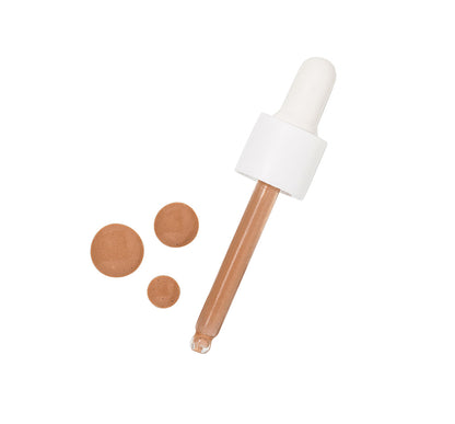 Tint-sational Serum dropper with medium to tan serum drops