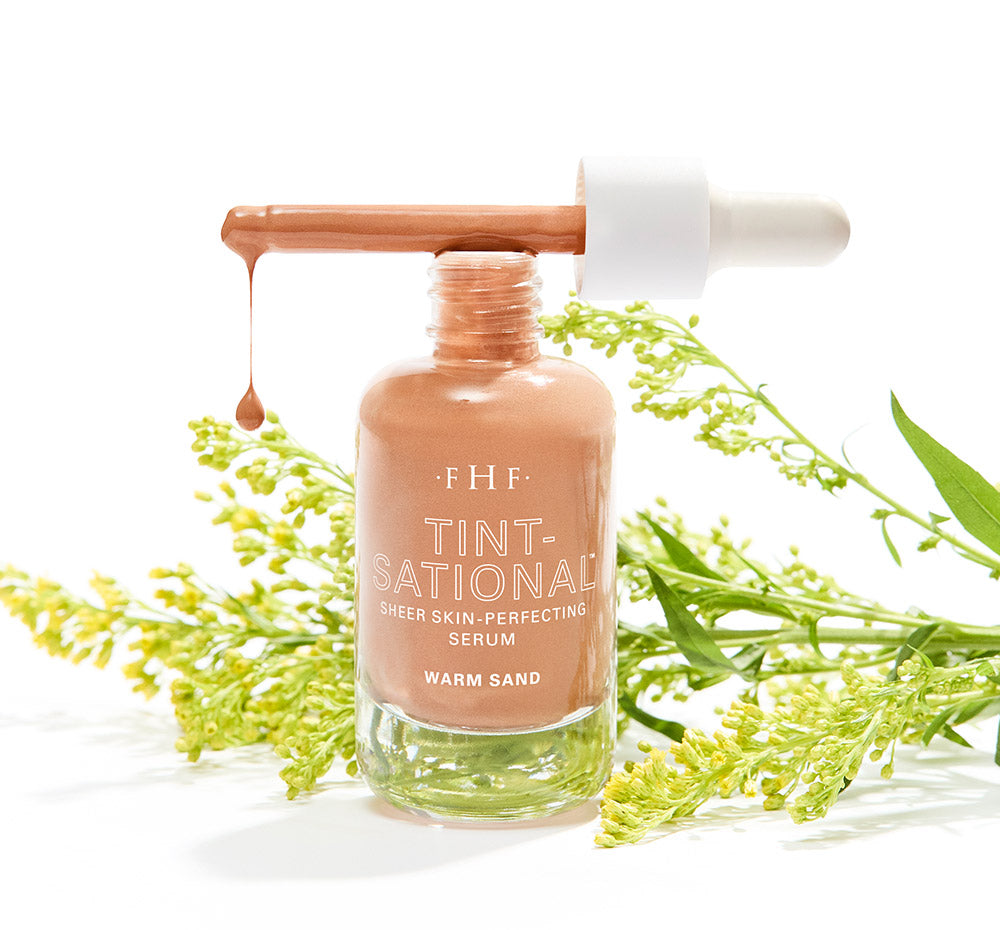 Tint-sational Sheer Skin-Perfecting Serum bottle with dropper in shade Warm Sand