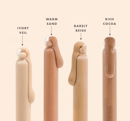 Set of four Tint-sational serum dropper applicators labeling shades 'Ivory Veil', 'Warm Sand', 'Barely Beige', and 'Rich Cocoa' 