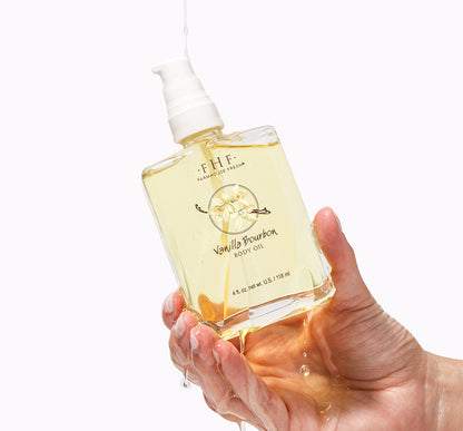 A bottle with pump of Vanilla Bourbon Body Oil by FarmHouse Fresh that is also perfect as massage oil.