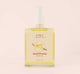 A bottle with pump of Vanilla Bourbon Body Oil by FarmHouse Fresh that is also perfect as massage oil.