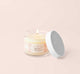 A travel-size Whoopie candle by Farmhouse Fresh made with all-natural blend of apricot and coconut wax.