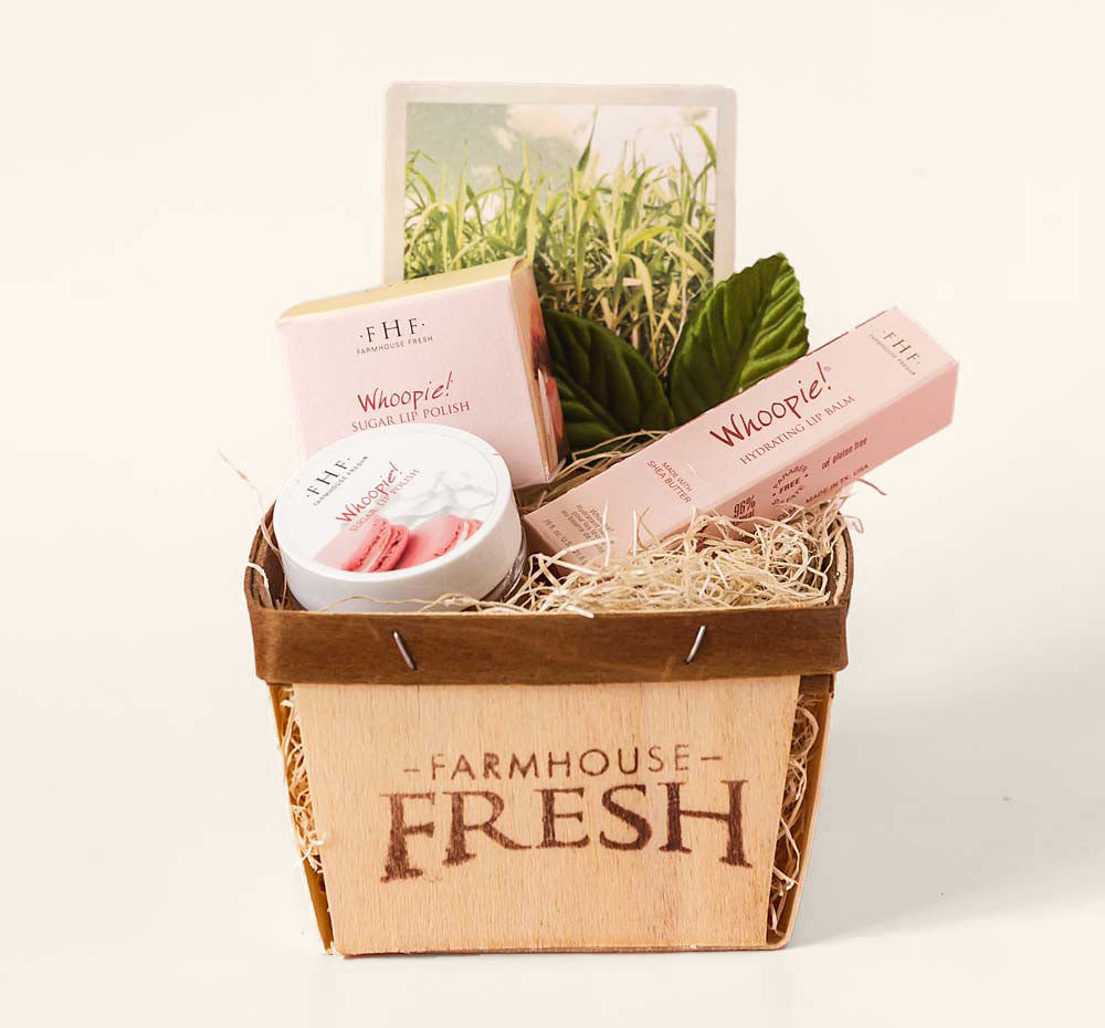 Whoopie Lip Gift Basket by Farmhouse Fresh that contains a hydrating lip balm and an exfoliating lip polish.