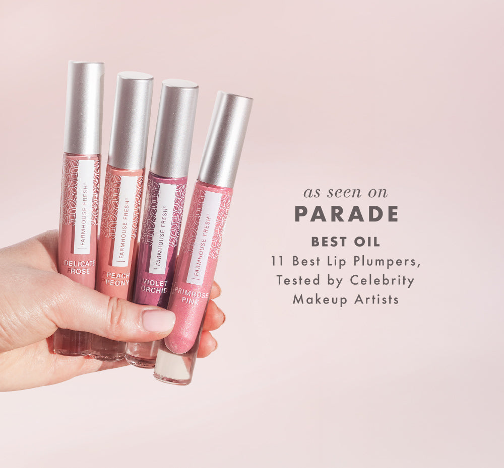 Four lip gloss tubes held by a hand against a pink background with text about best lip plumpers for Parade media mention.