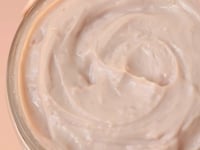 A video demonstrating the creamy texture of FarmHouse Fresh Mighty Brighty Vitamin C + Chamomile Brightening Face Mask.