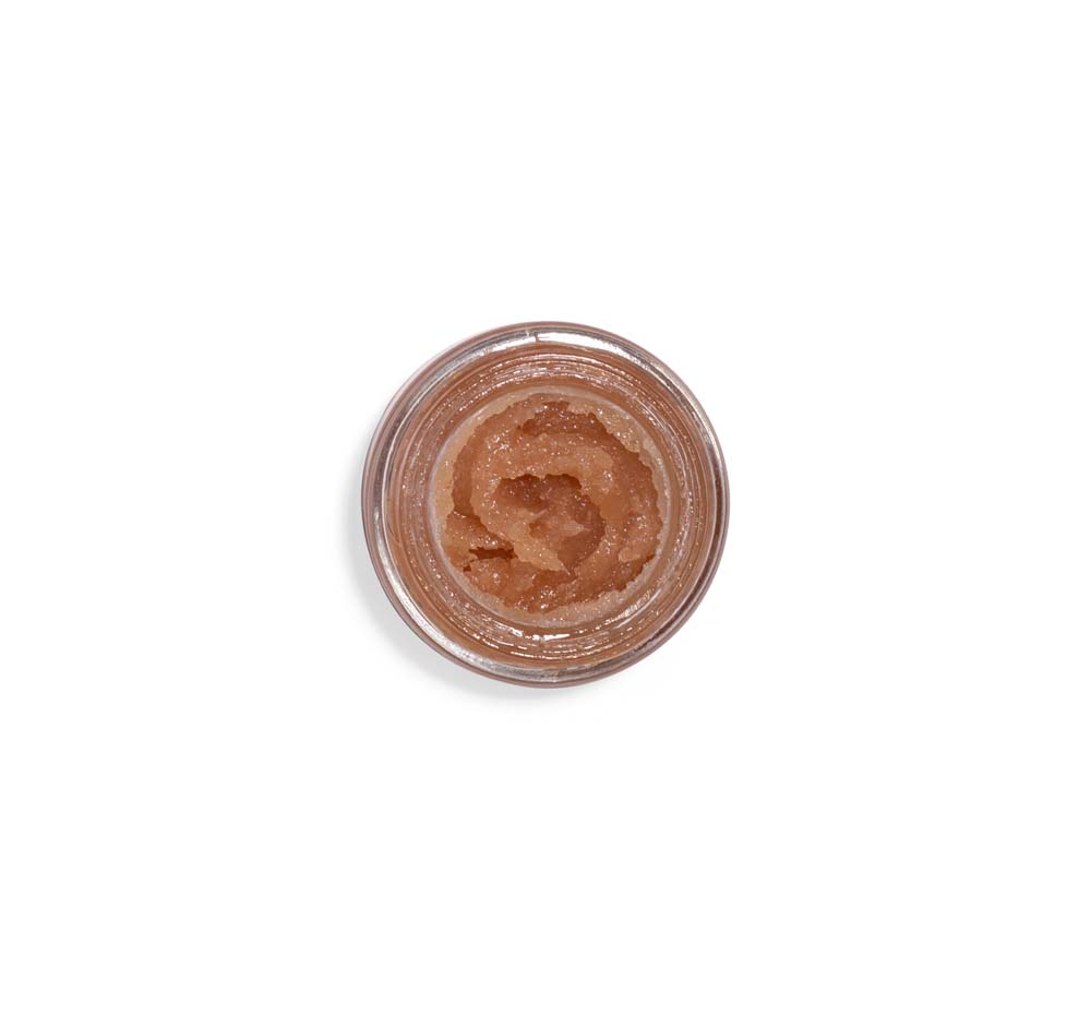 Top view of a jar of Farmhouse Fresh's Blackberry Wine Lip Polish, perfect for chapped lips.