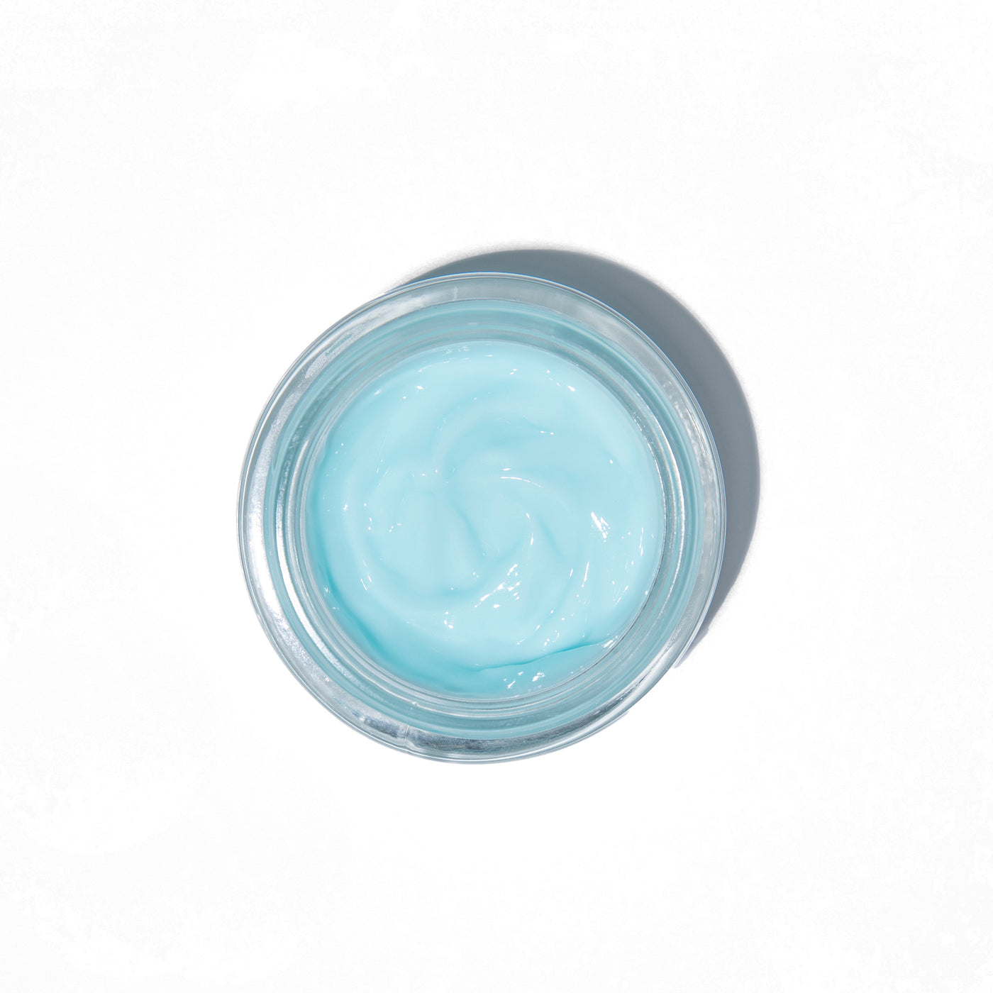 Top view of an opened jar of FarmHouse Fresh Bluephoria Chill-Out Super Moisture Mask made with calming, brightening, complexion perfecting CBD.