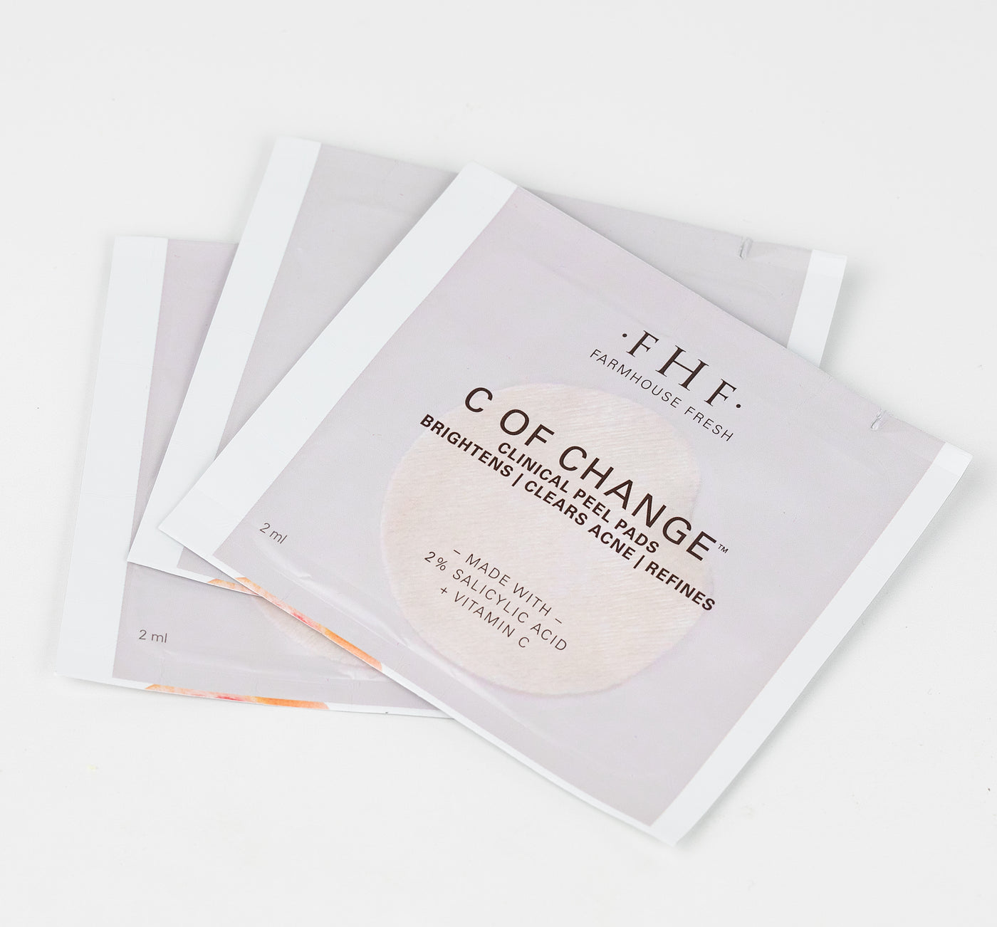 Sample packs of FarmHouse Fresh C of Change brightening peel pads.