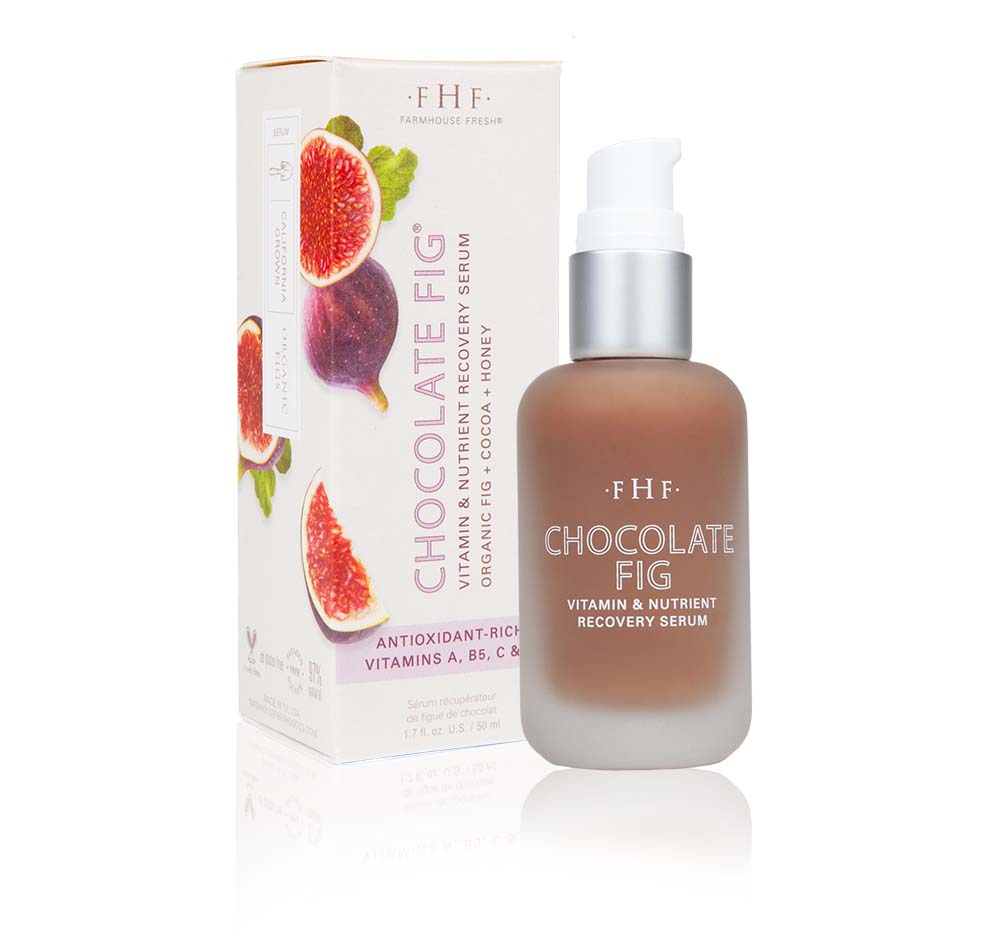 A bottle and a box of FarmHouse Fresh Chocolate Fig Vitamin Recovery Serum that erases the look of fine lines by deeply hydrating skin.