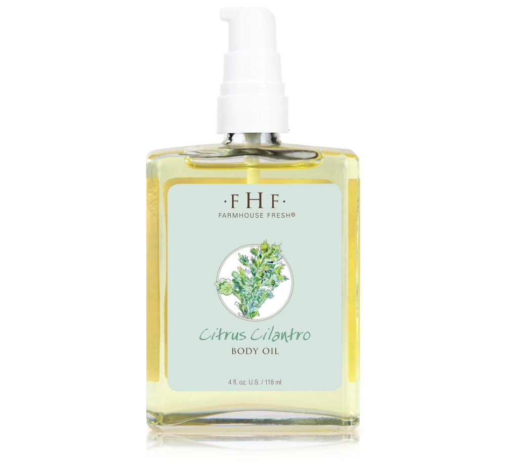 A bottle of Farmhouse Fresh's refreshing Citrus Cilantro body oil, perfect for aging skin.