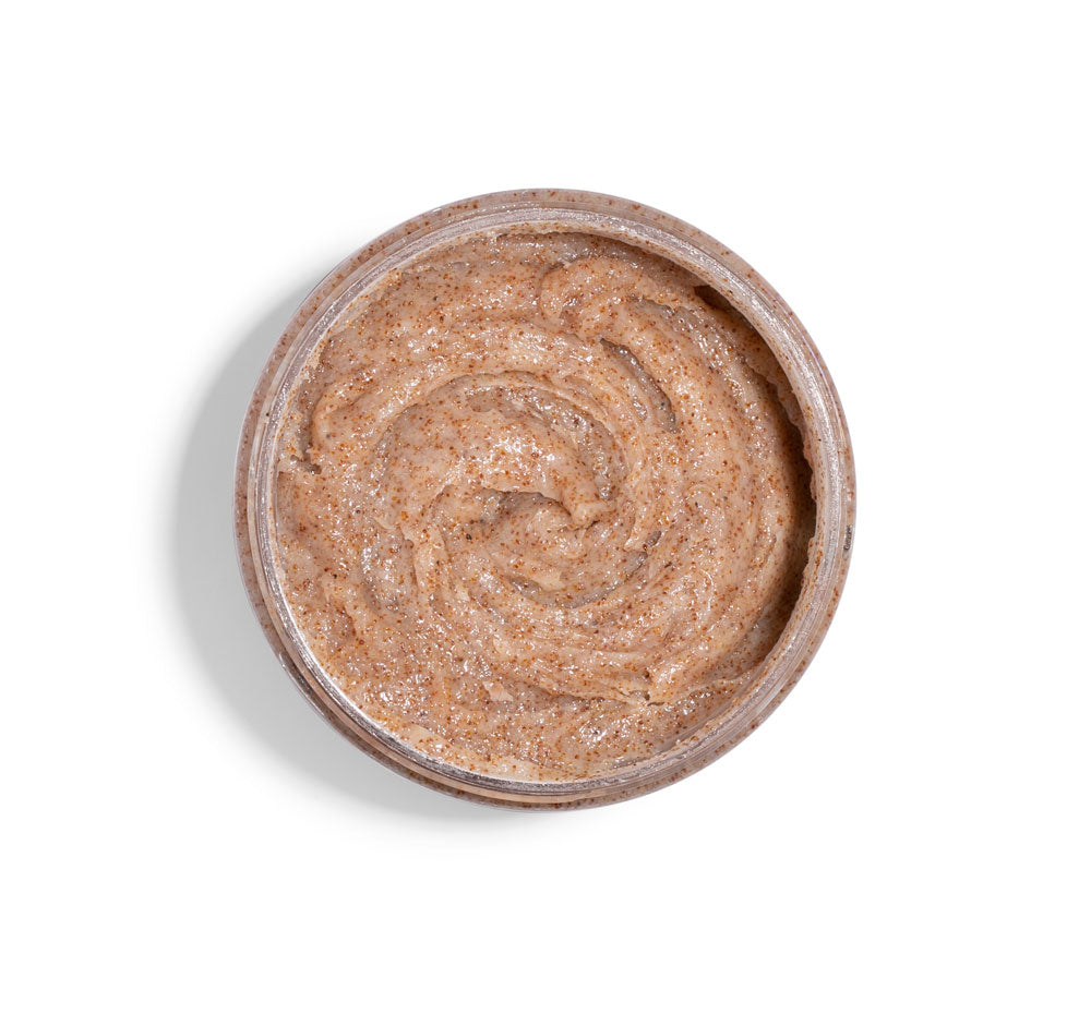 A jar of gentle, exfoliating Farmhouse Fresh Coconut Beach scrub on a white background.