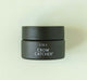 A jar of Crow Catcher eye serum by FarmHouse Fresh designed to diminish wrinkles in the eye area.
