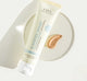 A tube and a swatch of Farmhouse Fresh's Elevated Shade® tinted sunscreen showing its lightweight texture.