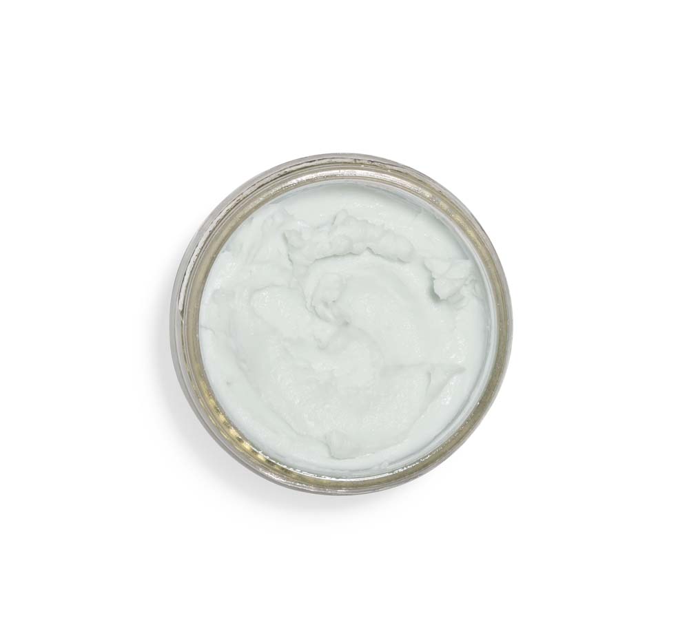 Top view of an opened jar of FarmHouse Fresh Enrich Mint Foot Rescue Mask that hydrates and nourishes dry cracked heels.